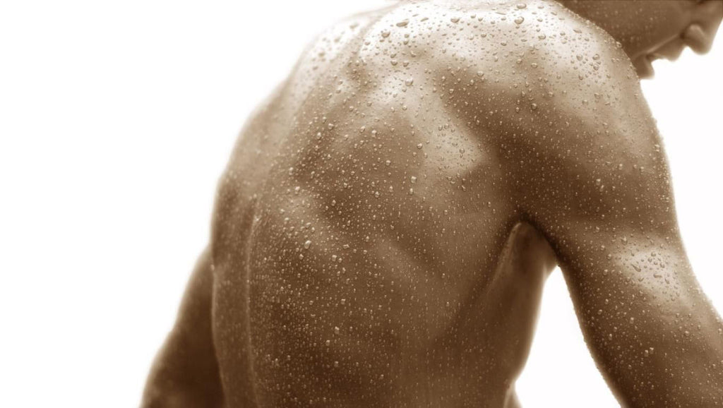 Male body with sweat drops